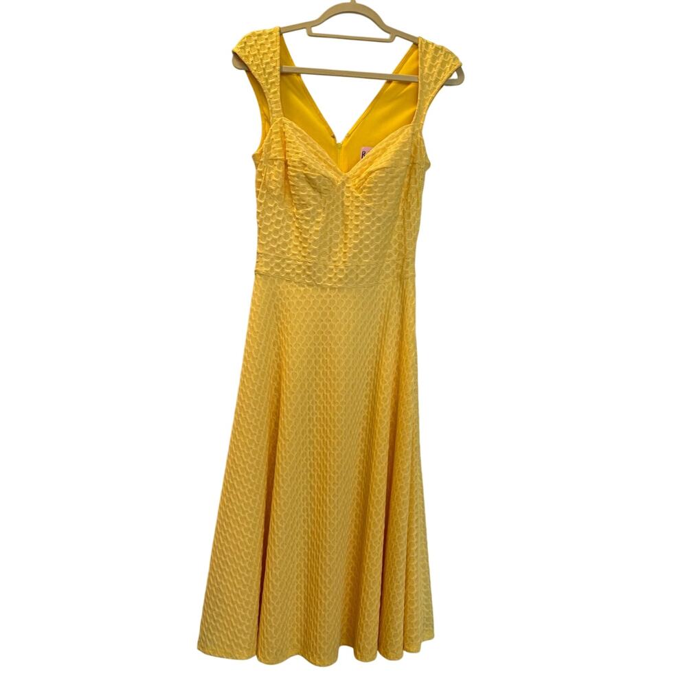 Rock ultimate retro vibes with this stunning Bettie Page "Queen of Pinups" dress
